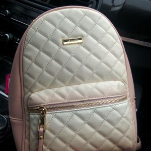 Aldo woman's pink and tan medium size backpack bag